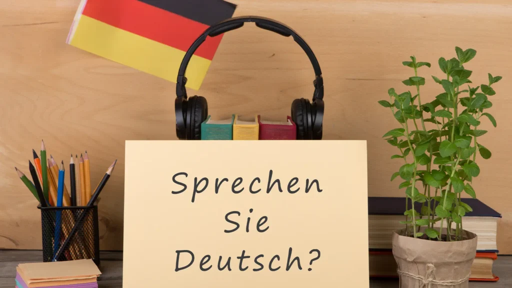 Almanca konuşma pratiği için hazırlanmış Sprechen Sie Deutsch yazılı çalışma masası